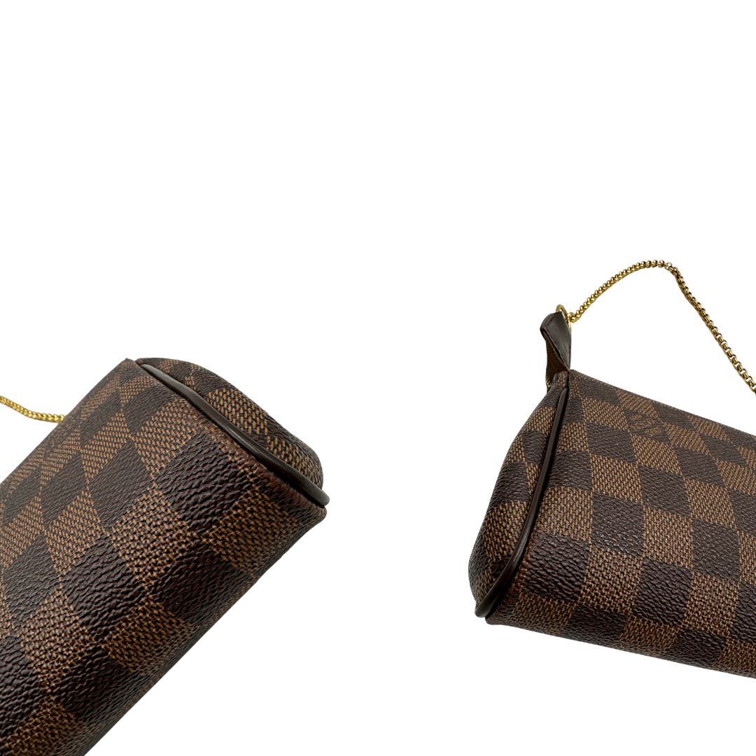 Pochette Eva Damier Ébène Louis Vuitton