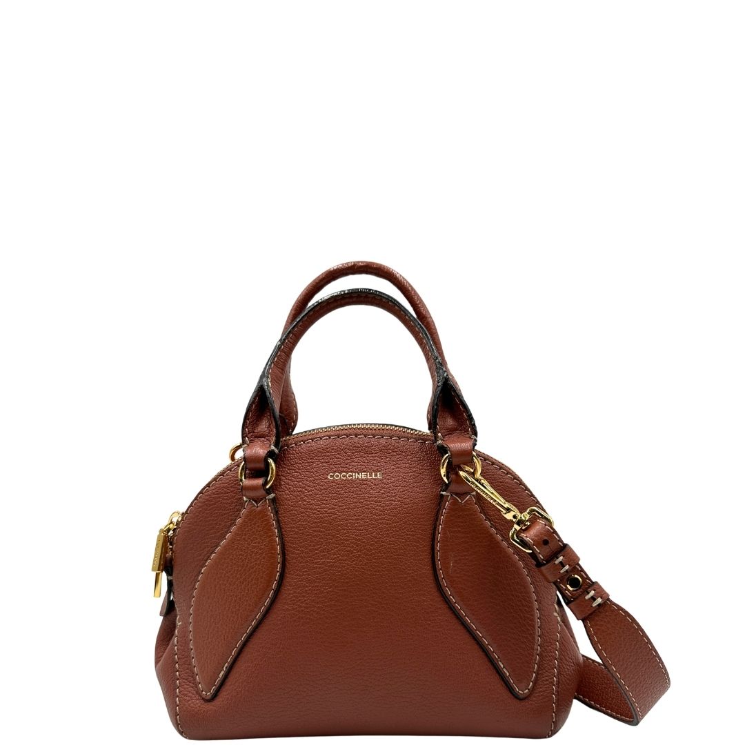 front Borsa Coccinelle in pelle color marsala con hardware dorato, di lusso, originale, ottime condizioni, usata 
