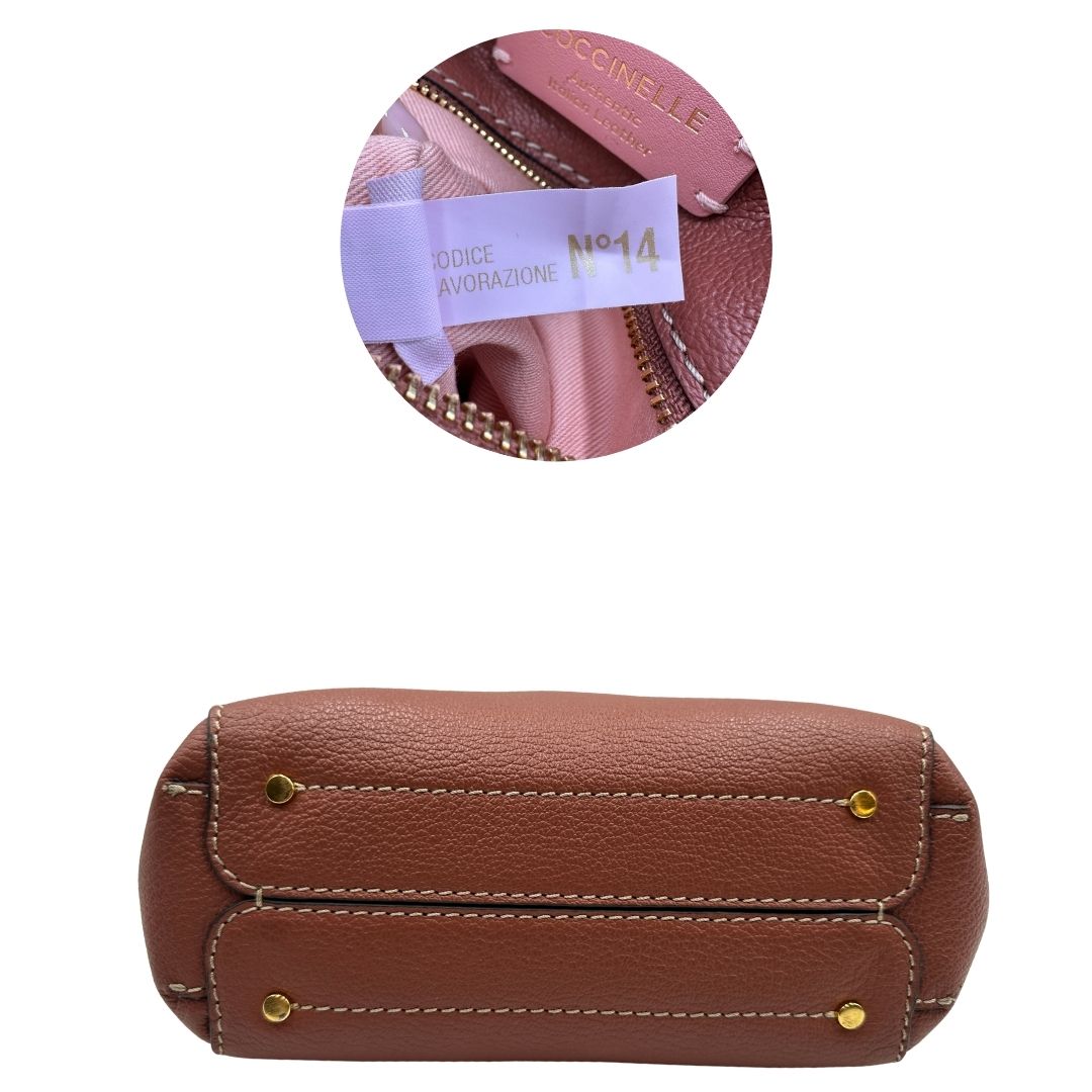 base Borsa Coccinelle in pelle color marsala con hardware dorato, di lusso, originale, ottime condizioni, usata 