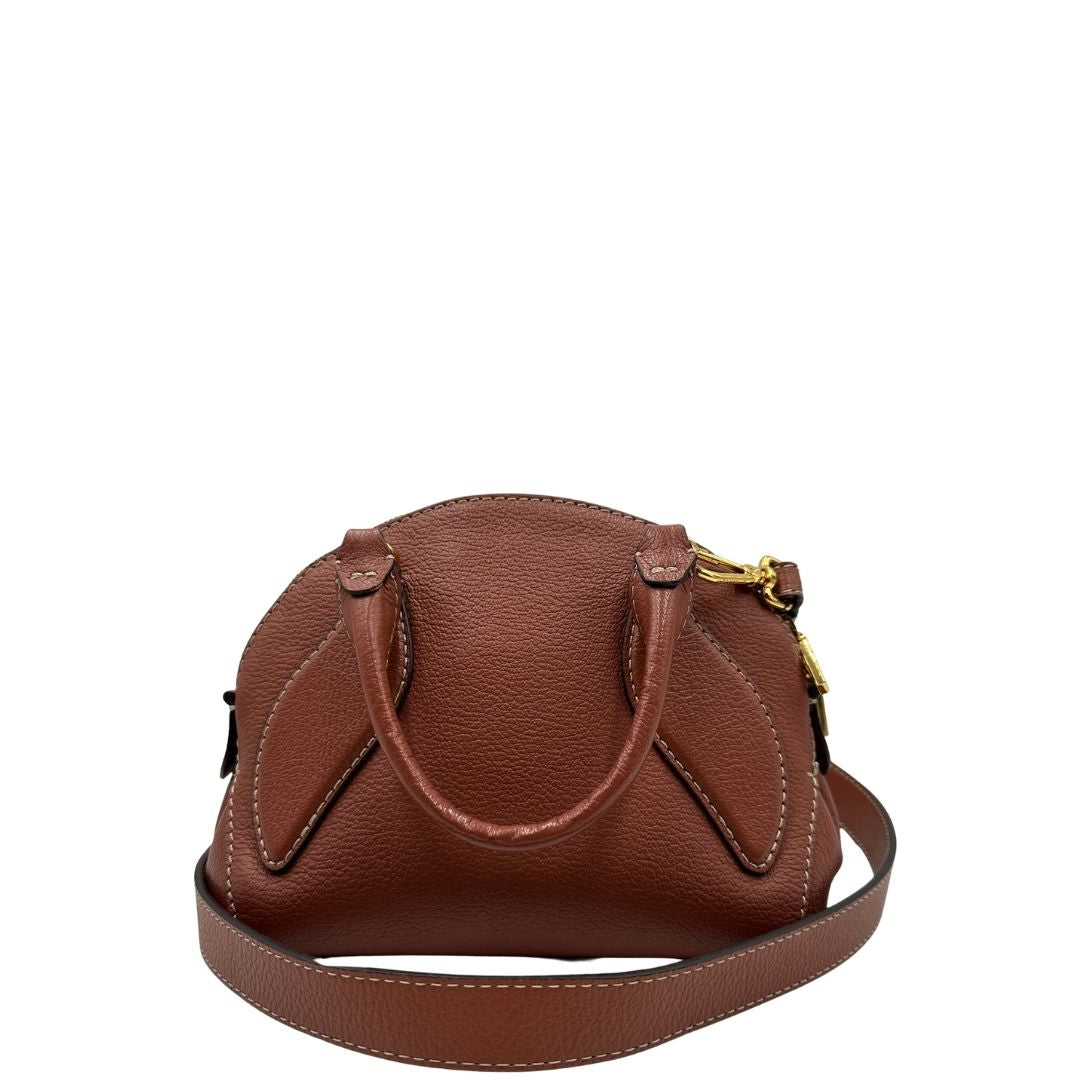 retro Borsa Coccinelle in pelle color marsala con hardware dorato, di lusso, originale, ottime condizioni, usata 