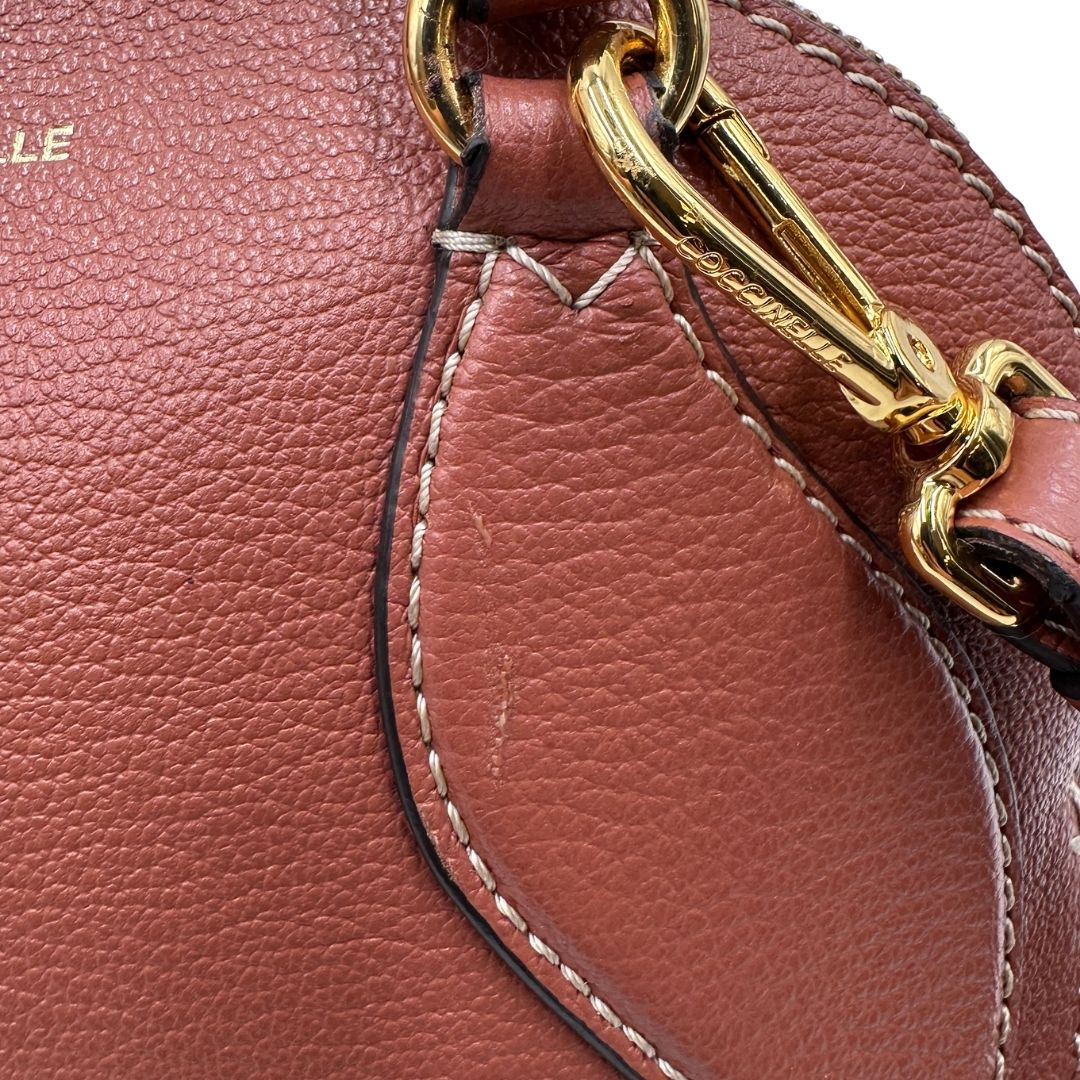 Borsa Coccinelle in pelle color marsala con hardware dorato, di lusso, originale, ottime condizioni, usata