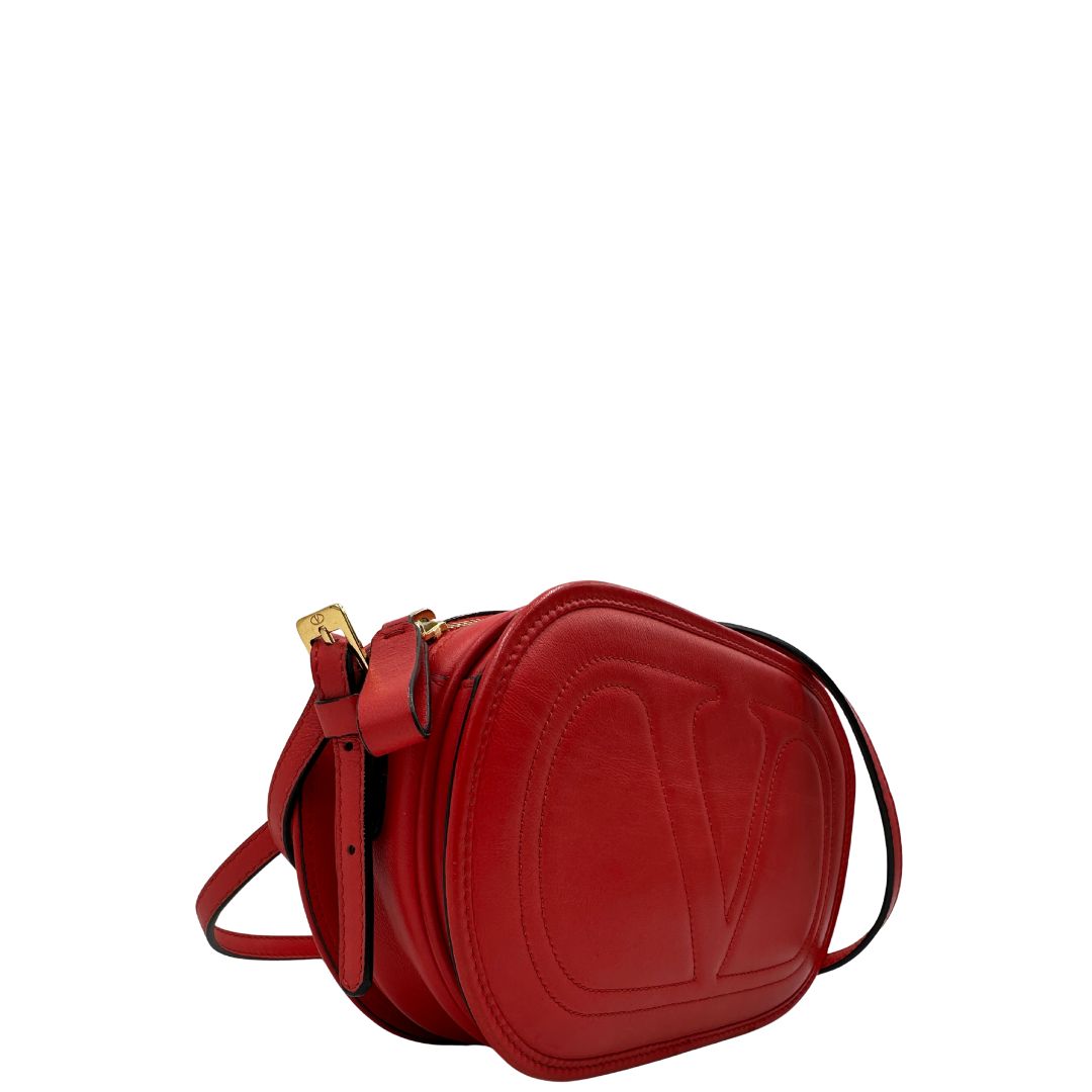 lato Borsa VG in pelle rossa con parti metalliche dorate