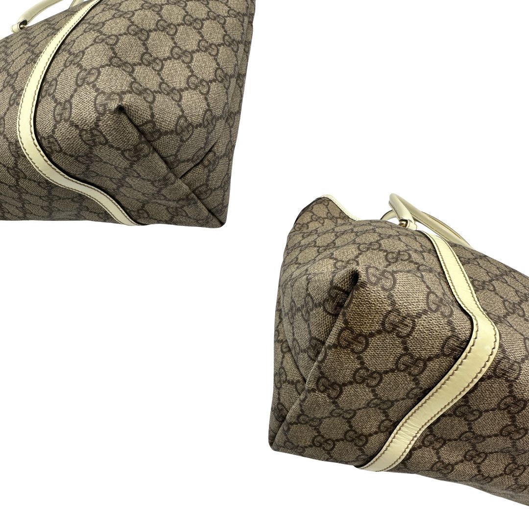 angoli Borsa Gucci in canvas GG beige 
