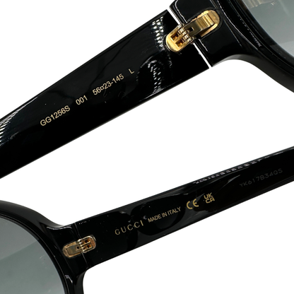 Occhiali da sole Gucci realizzati in acetato nero e hardware dorato. Originali, usati, di lusso, in ottime condizioni.