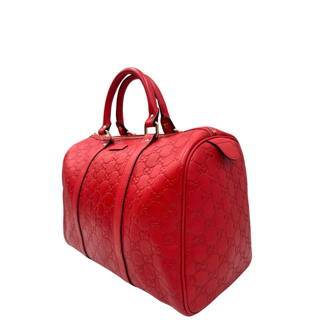 lato Borsa Gucci Boston in pelle trama guccissima rossa, di lusso, originale, ottime condizioni, usata