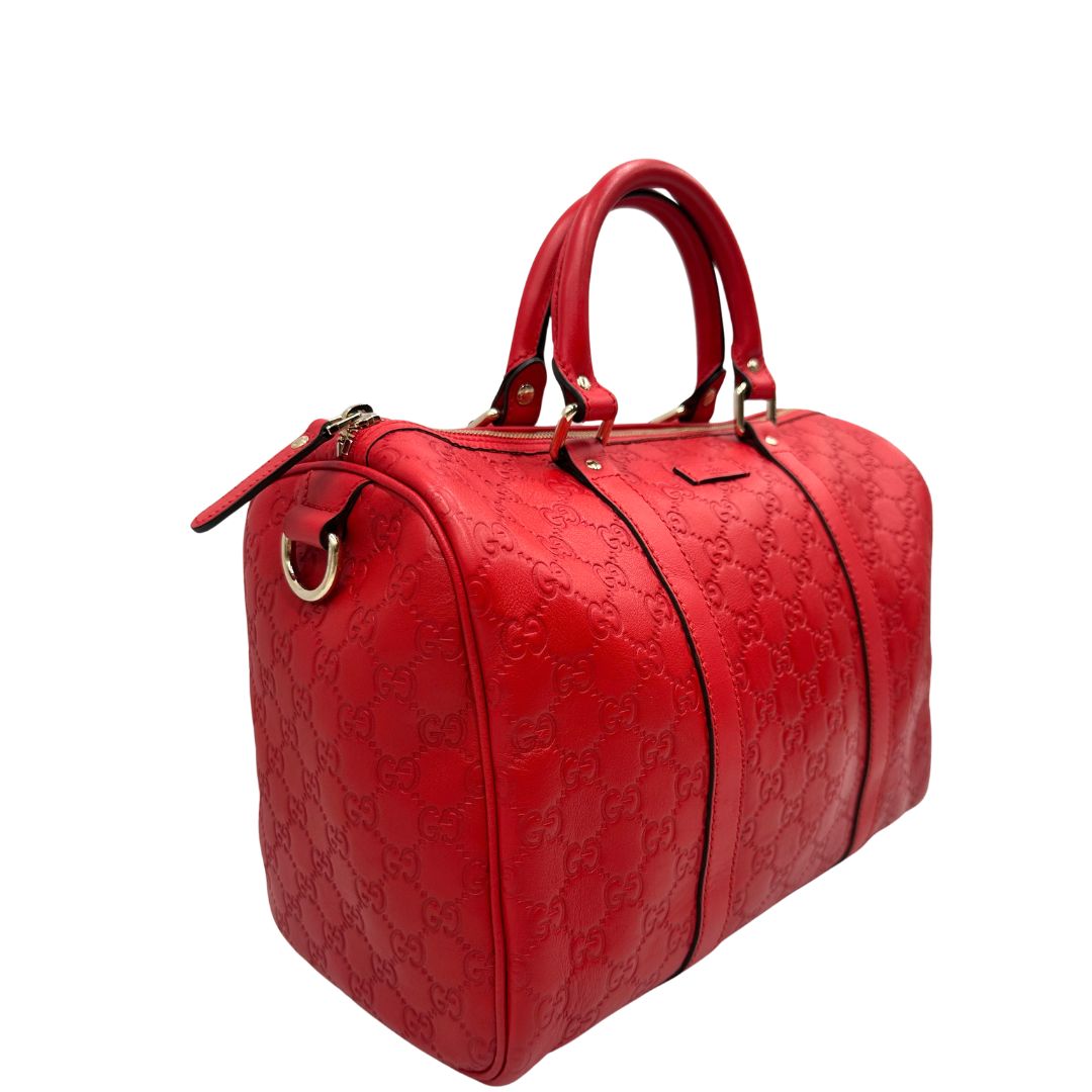 lato Borsa Gucci Boston in pelle trama guccissima rossa, di lusso, originale, ottime condizioni, usata 