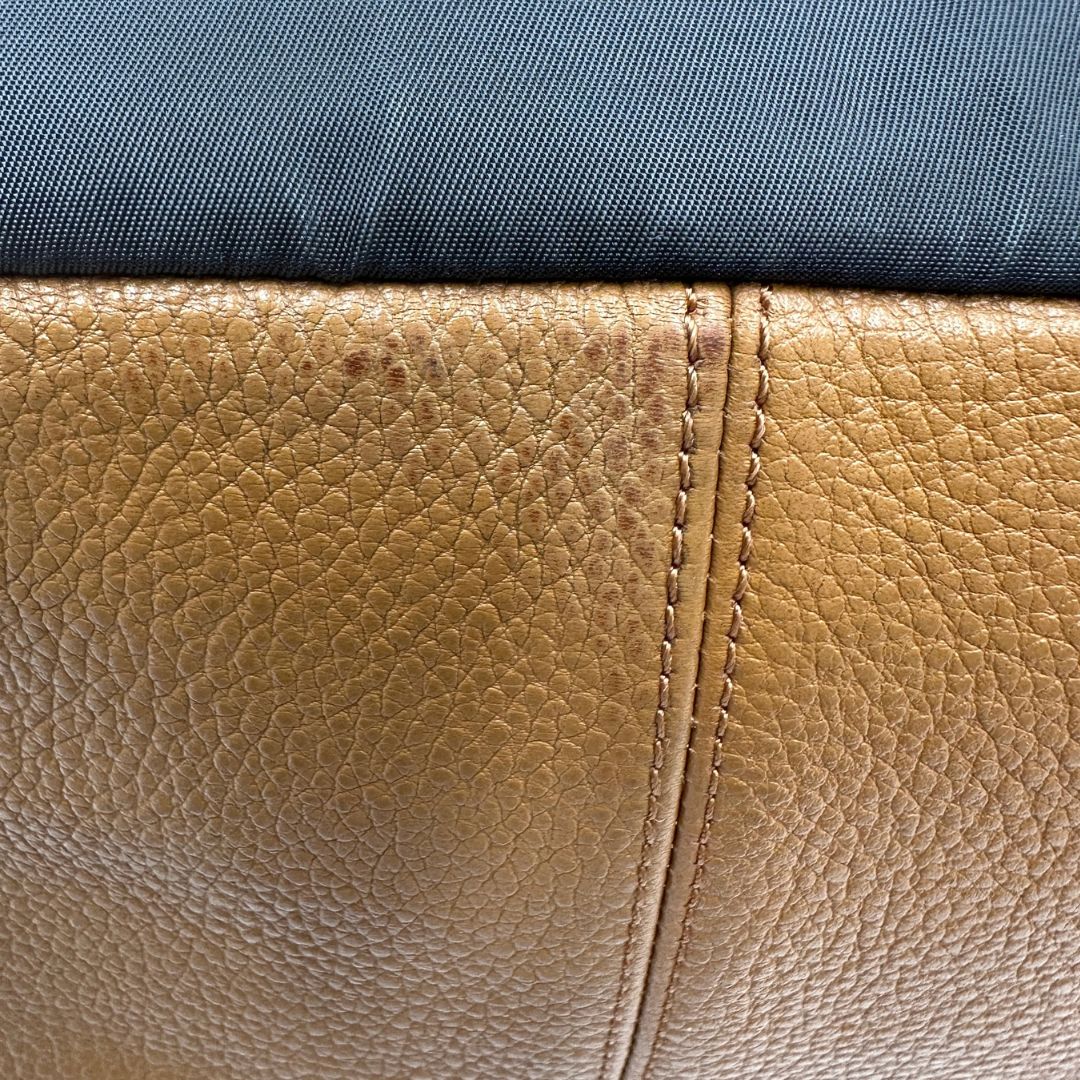 Zaino Coach in pelle martellata color cammello