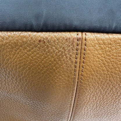 Zaino Coach in pelle martellata color cammello