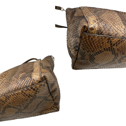 angoli Borsa Gucci in pregiata pelle esotica  