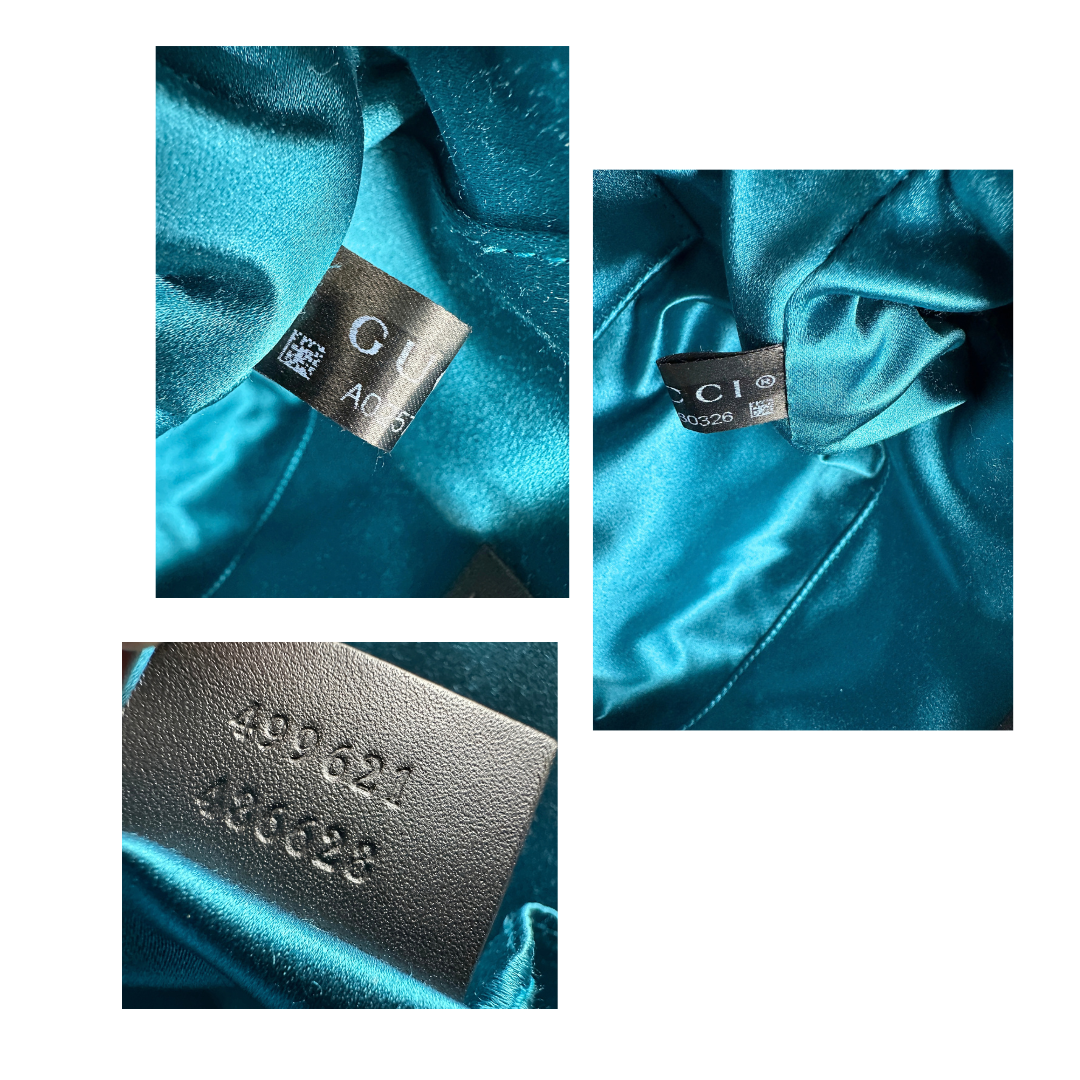 Codice,  Borsa Gucci in pelle scamosciata color rosso con finiture in pelle verniciata nera, impreziosita da iconica striscia Web blu e rossa, indossabile a tracolla.
