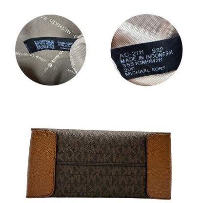  base Borsa MK in canvas sulle tonalità del marrone con stampa logo MK 