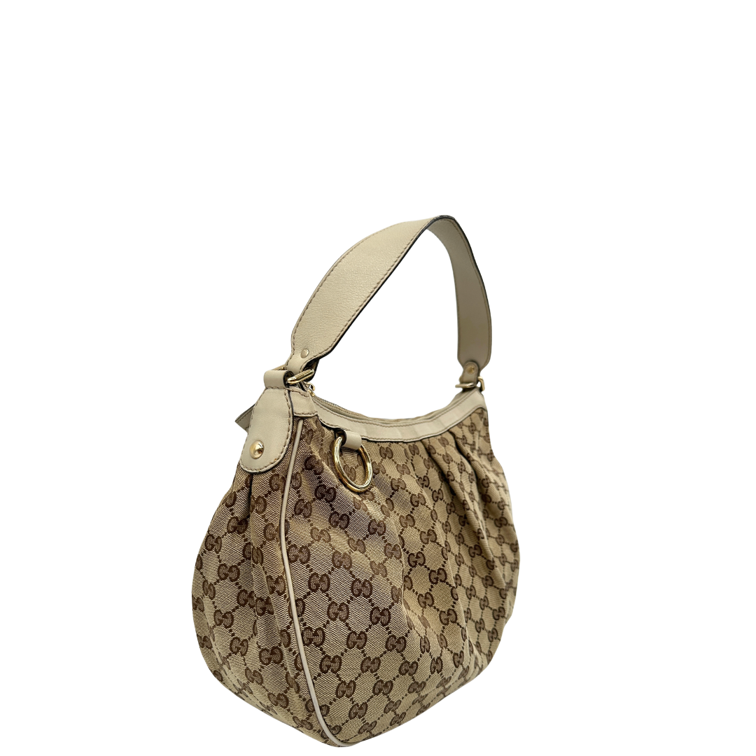 lato Borsa Gucci in tessuto GG e pelle bianco avorio, di lusso, originale, usata 