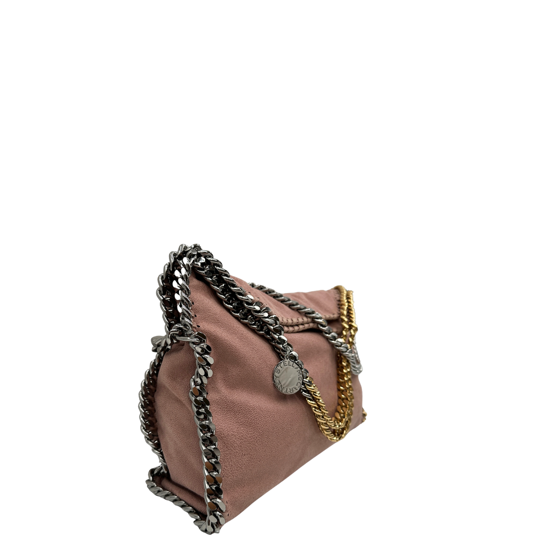 Lato, Borsa Stella McCartney Falabella Fold Over Tote in tessuto vegano rosa antico con catene dorate e argentate. Da portare a mano oppure a spalla. Originale, usata, di lusso, in ottime condizioni.