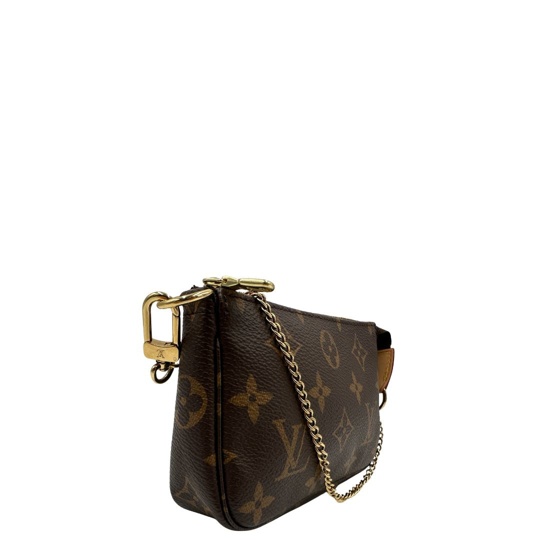 Pochette Mini Accessoires Louis Vuitton in canvas marrone