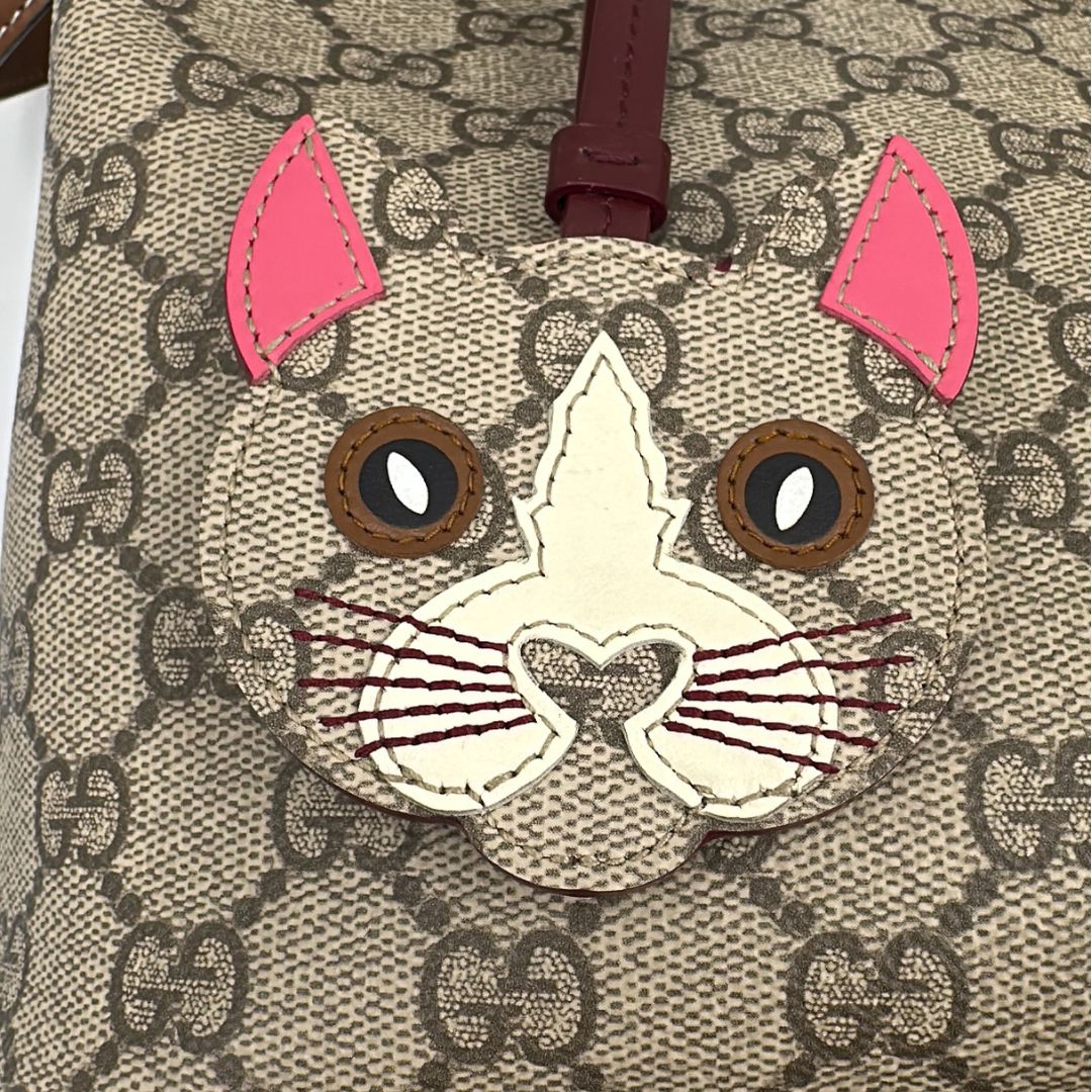 Secchiello Gucci GG Supreme in pelle marrone
