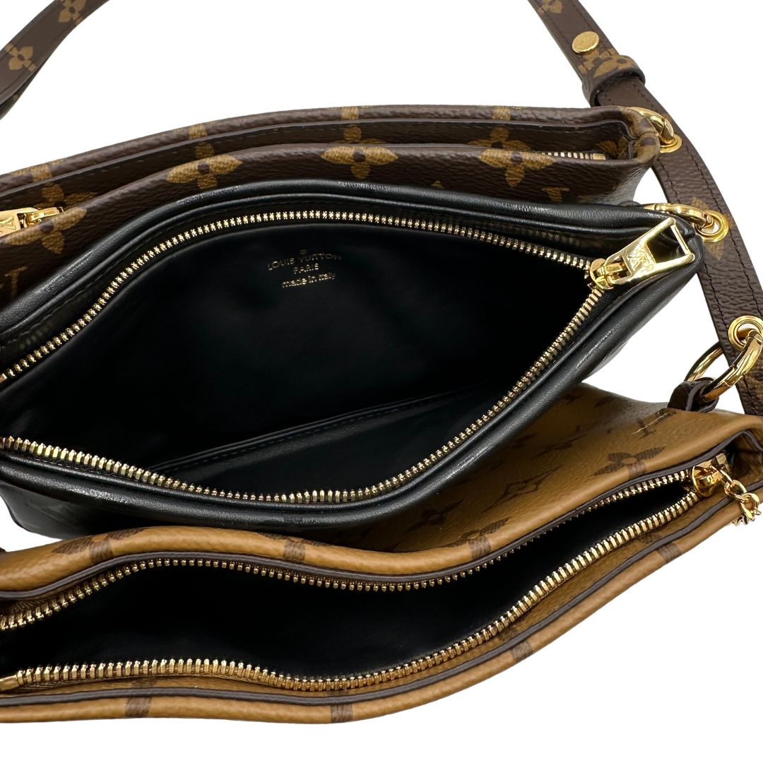 Pochette LV3 Pouch Reverse Louis Vuitton in pelle marrone
