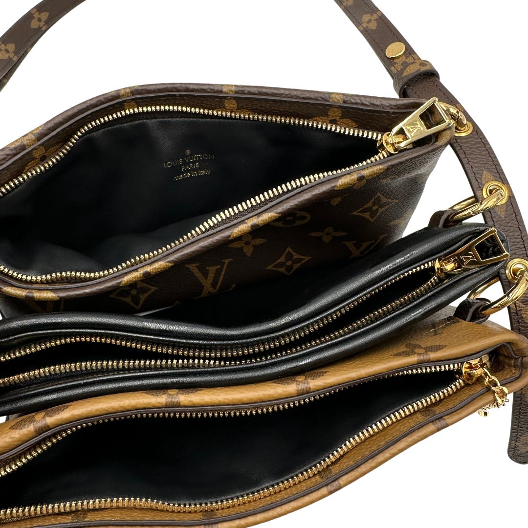Pochette LV3 Pouch Reverse Louis Vuitton in pelle marrone