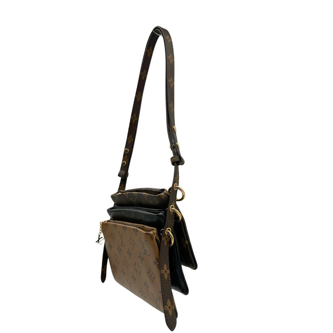 Pochette LV3 Pouch Reverse Louis Vuitton in pelle marrone