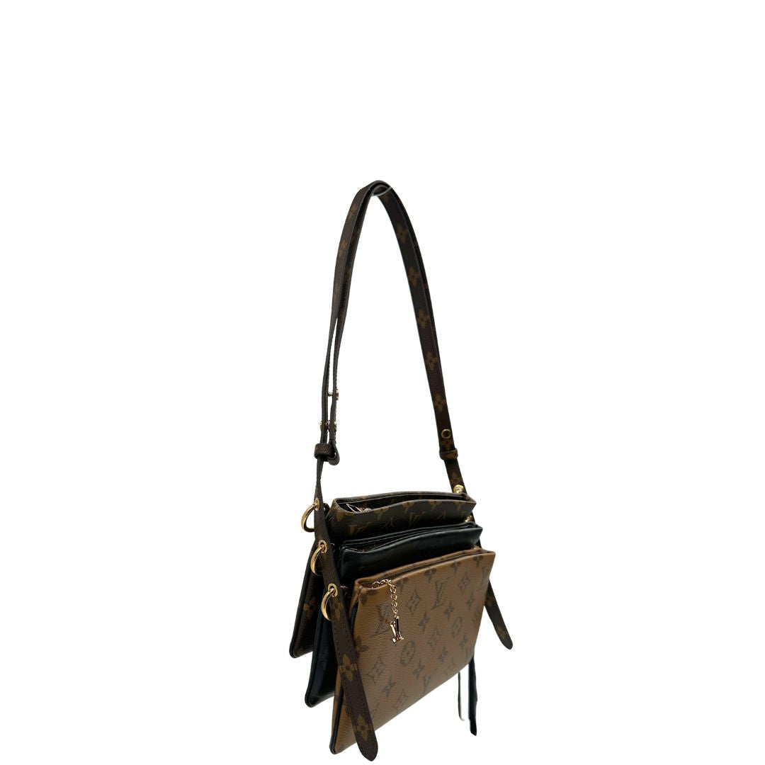 Pochette LV3 Pouch Reverse Louis Vuitton in pelle marrone