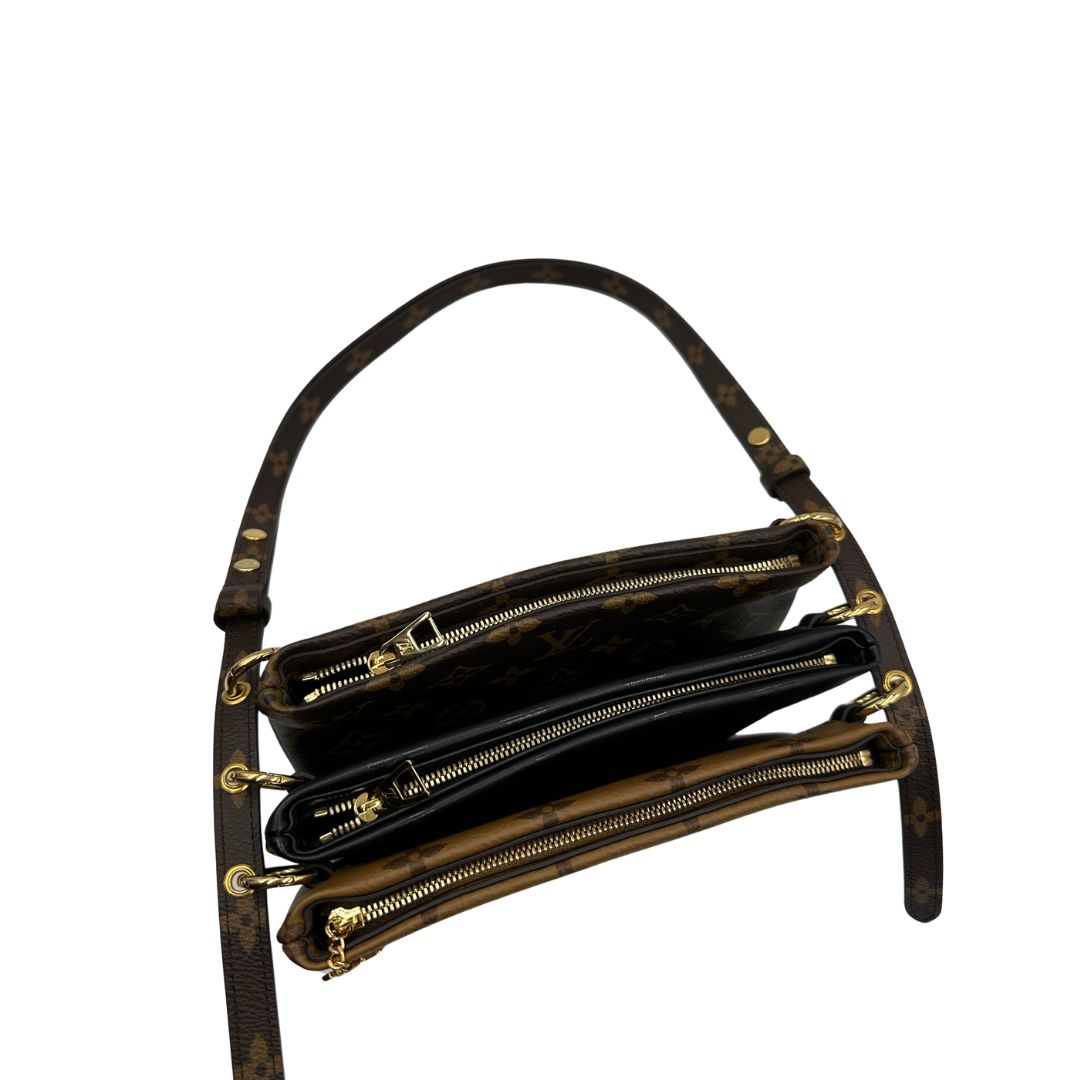 Pochette LV3 Pouch Reverse Louis Vuitton in pelle marrone