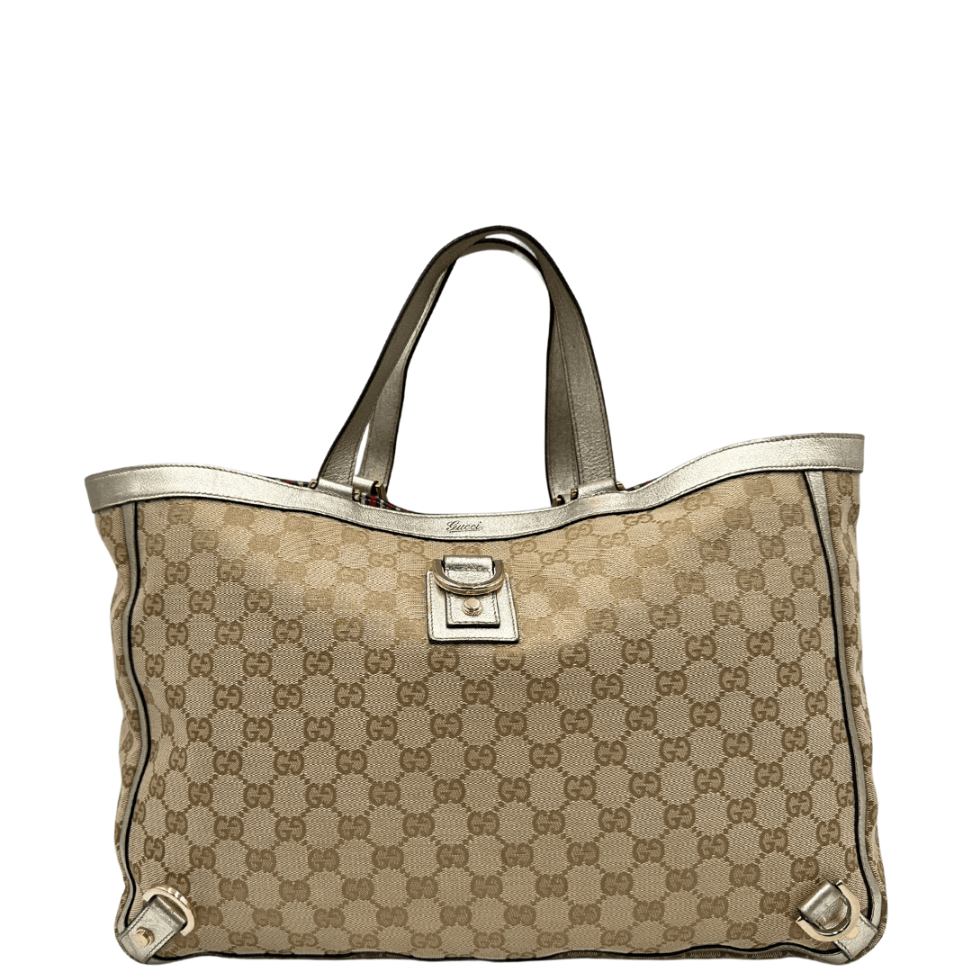 Borsa Gucci gg supreme in tela beige con profili in pelle color oro. Borse di marca usate