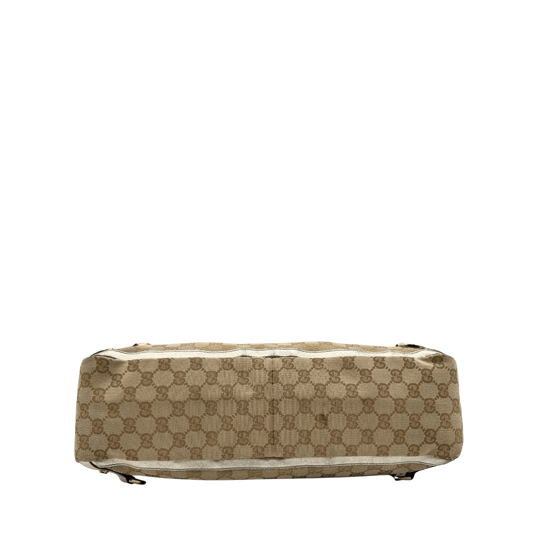 Borsa Gucci gg supreme in tela beige con profili in pelle color oro. Borse di marca usate