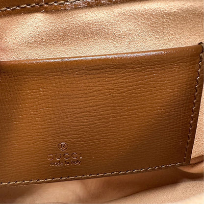 interno  Borsa Gucci Jackie in canvas GG e pelle marrone, munita di un elemento allungabile per poterla portare comodamente a tracolla, di lusso, originale, eccellenti condizioni, usata.  