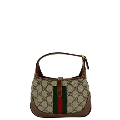 retro  Borsa Gucci Jackie in canvas GG e pelle marrone, munita di un elemento allungabile per poterla portare comodamente a tracolla, di lusso, originale, eccellenti condizioni, usata. 