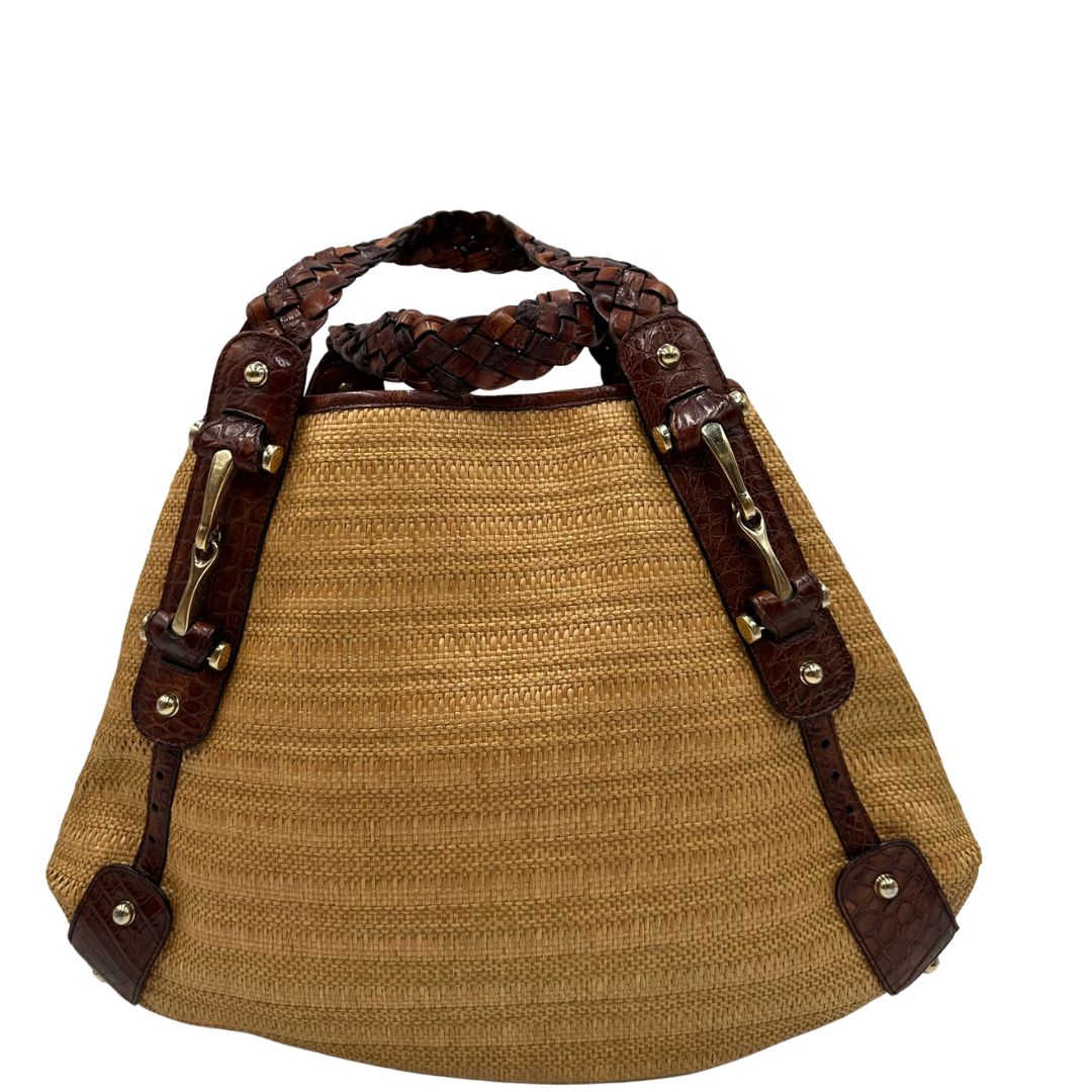 retro Borsa Gucci caratterizzata da un corpo in rafia intrecciata, manici in pelle intrecciata e dettagli in metallo dorato, di lusso, originale, ottime condizioni. 