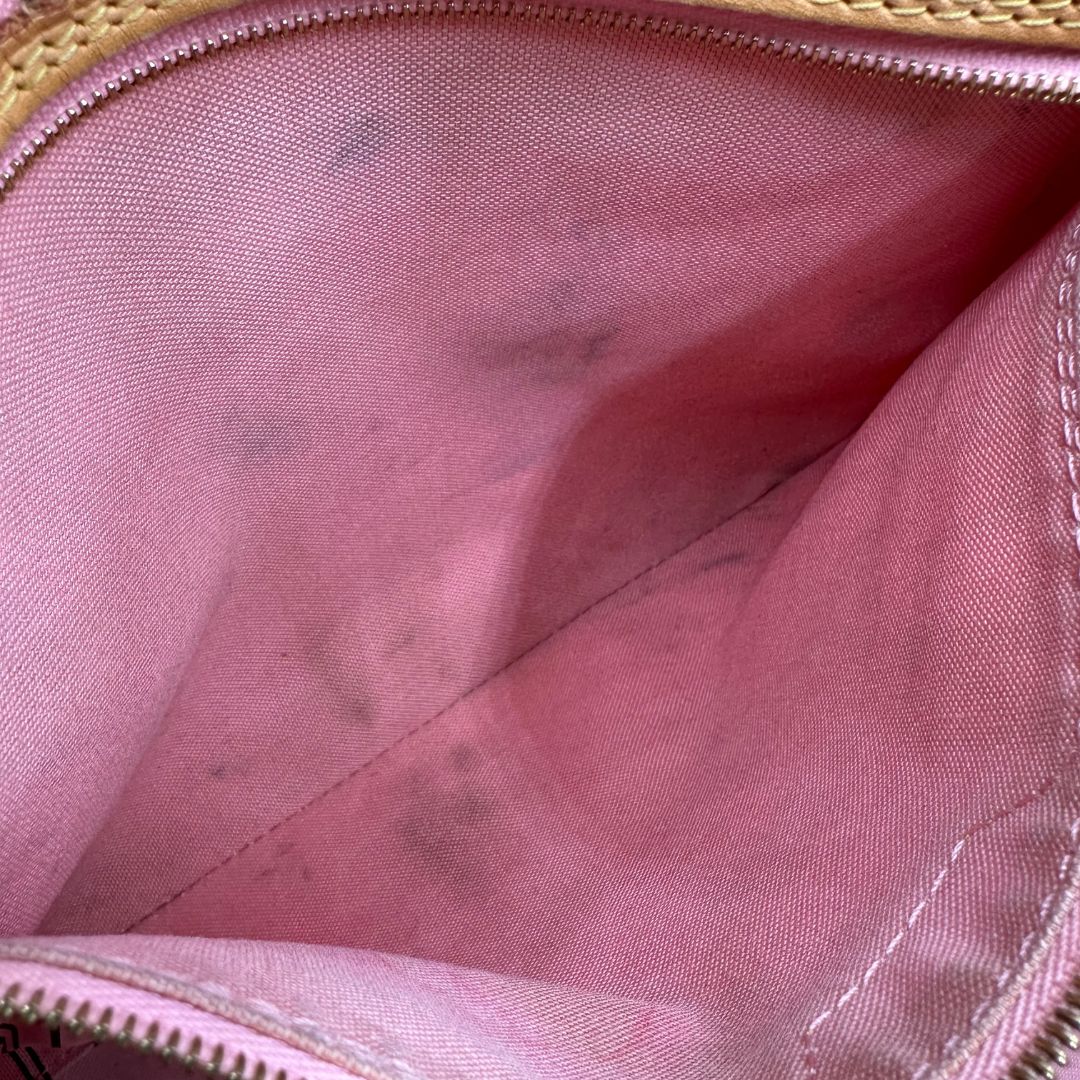 interno Borsa Louis Vuitton Neverfull MM in canvas marrone monogram con finiture in vacchetta naturale e parti metalliche dorate, caratterizzata da motivo Palm Dots; munita di doppi manici, indossabile a spalla, di lusso, originale, ottime condizioni. 