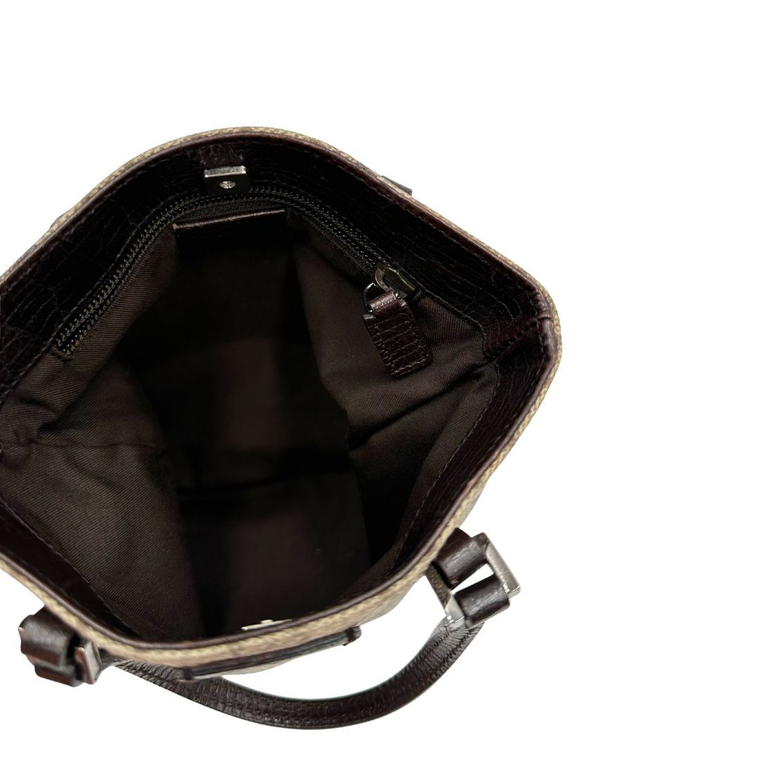 Interno, Borsa Gucci GG in canvas beige e dettagli in pelle marroni testa di moro, indossabile a mano. Originale, usata, di lusso, in ottime condizioni.
