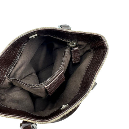 Tasca interna, Borsa Gucci GG in canvas beige e dettagli in pelle marroni testa di moro, indossabile a mano. Originale, usata, di lusso, in ottime condizioni.