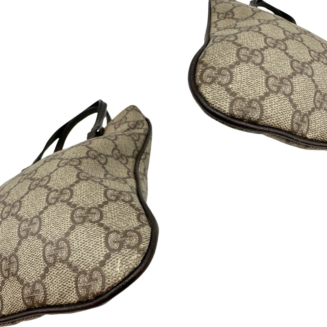 Angoli, Borsa Gucci GG in canvas beige e dettagli in pelle marroni testa di moro, indossabile a mano. Originale, usata, di lusso, in ottime condizioni.