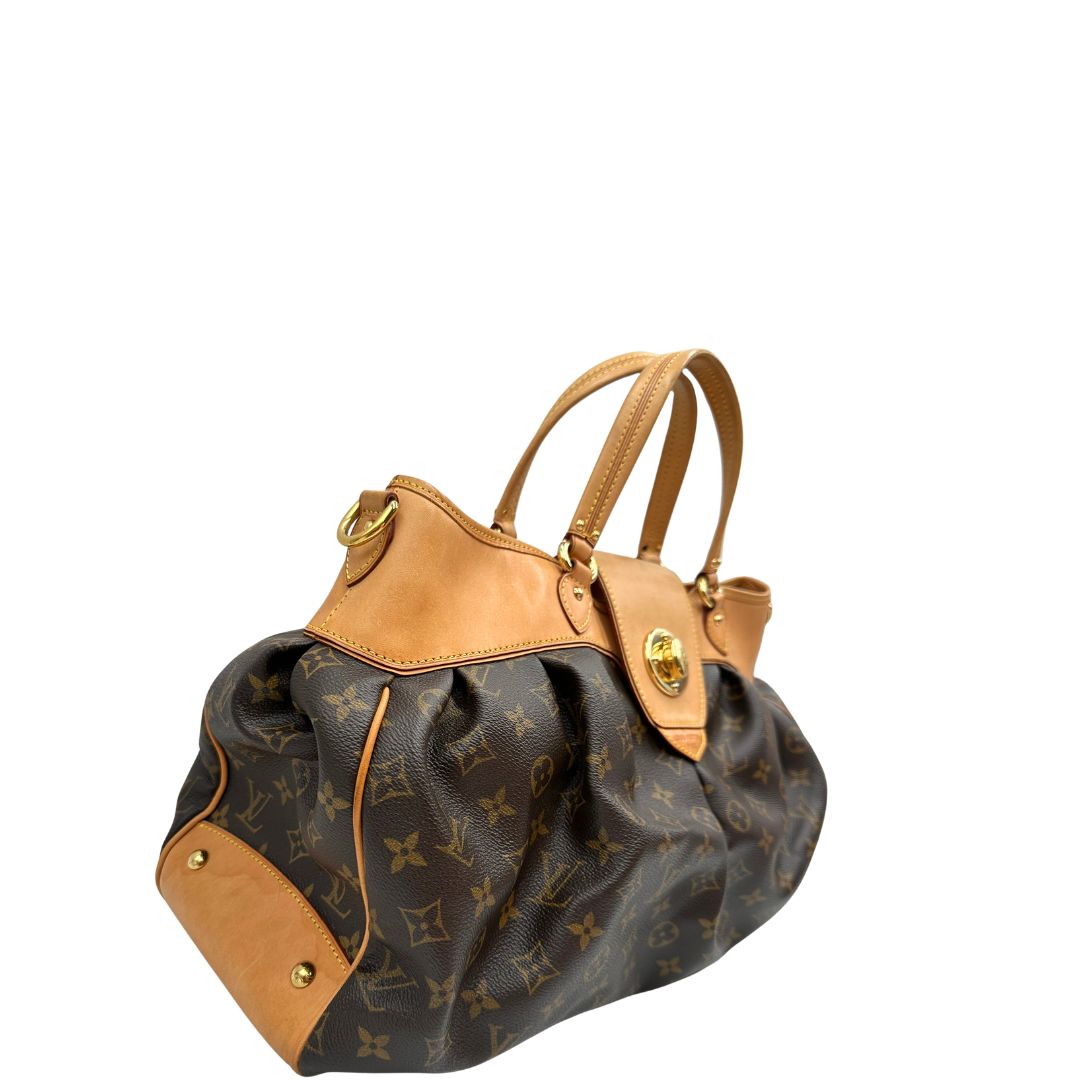 Laterale, Borsa LV Trouville in tela monogram e vacchetta naturale. Originale, usata, di lusso, in ottime condizioni.