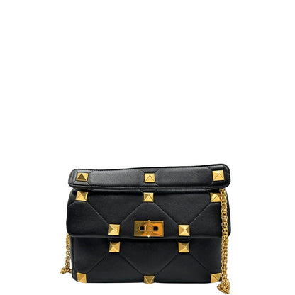 Front, Borsa V.G. in pelle nera impreziosita da iconiche borchie piramidali dorate, di lusso, originale, ottime condizioni, usata. 
