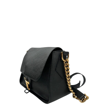 Lato sinistro, Borsa Tod's in pelle martellata nera con hardware dorato, indossabile a tracolla. Originale, usata, di lusso, in ottime condizioni.