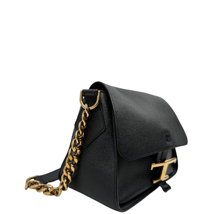 Lato destro, Borsa Tod's in pelle martellata nera con hardware dorato, indossabile a tracolla. Originale, usata, di lusso, in ottime condizioni.