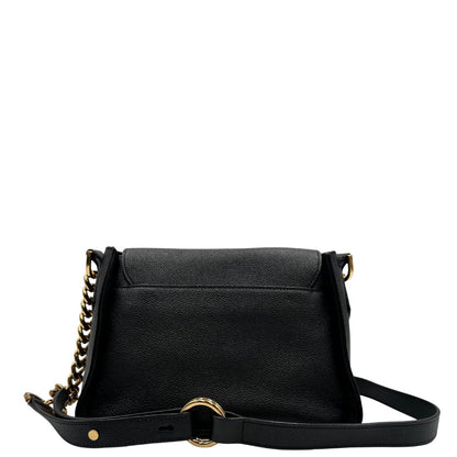 Retro, Borsa Tod's in pelle martellata nera con hardware dorato, indossabile a tracolla. Originale, usata, di lusso, in ottime condizioni.