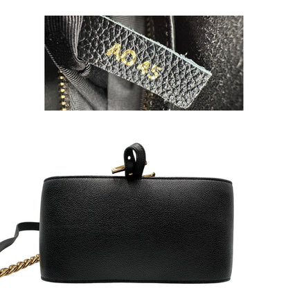 Codice e base, Borsa Tod's in pelle martellata nera con hardware dorato, indossabile a tracolla. Originale, usata, di lusso, in ottime condizioni.