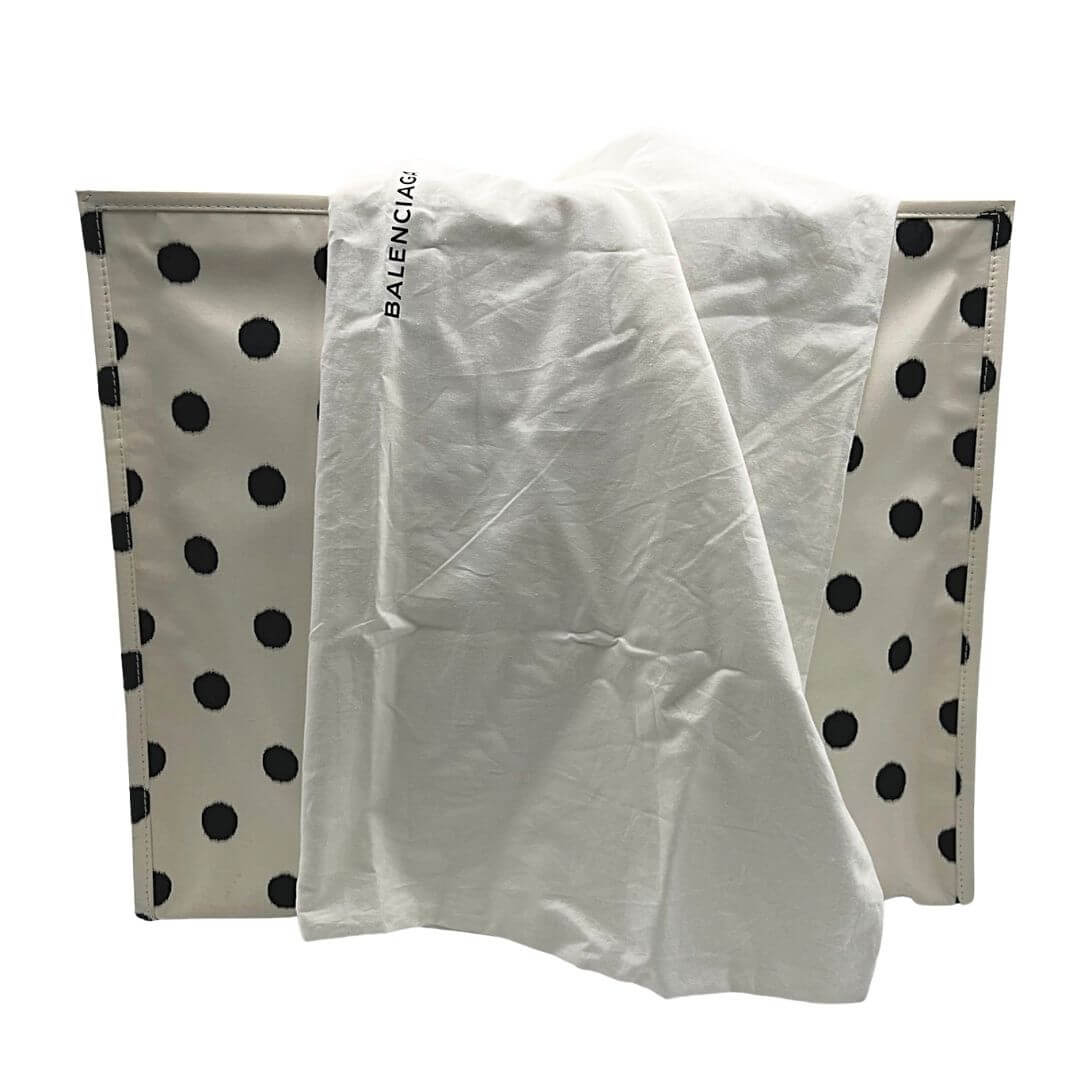Foto borsone Balenciaga a pois e tessuto bianco. Borse di marca usate