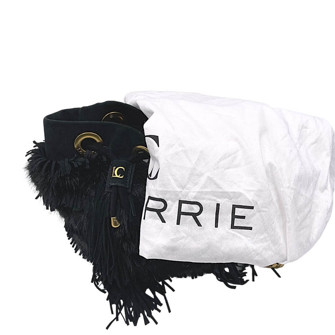 Foto secchiello La Carrie in pelle scamosciata e frange nero. Borse di marca usate.