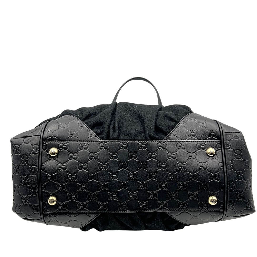 Foto borsa a spalla Gucci in tessuto nero con profili in pelle. Borse di marca usate