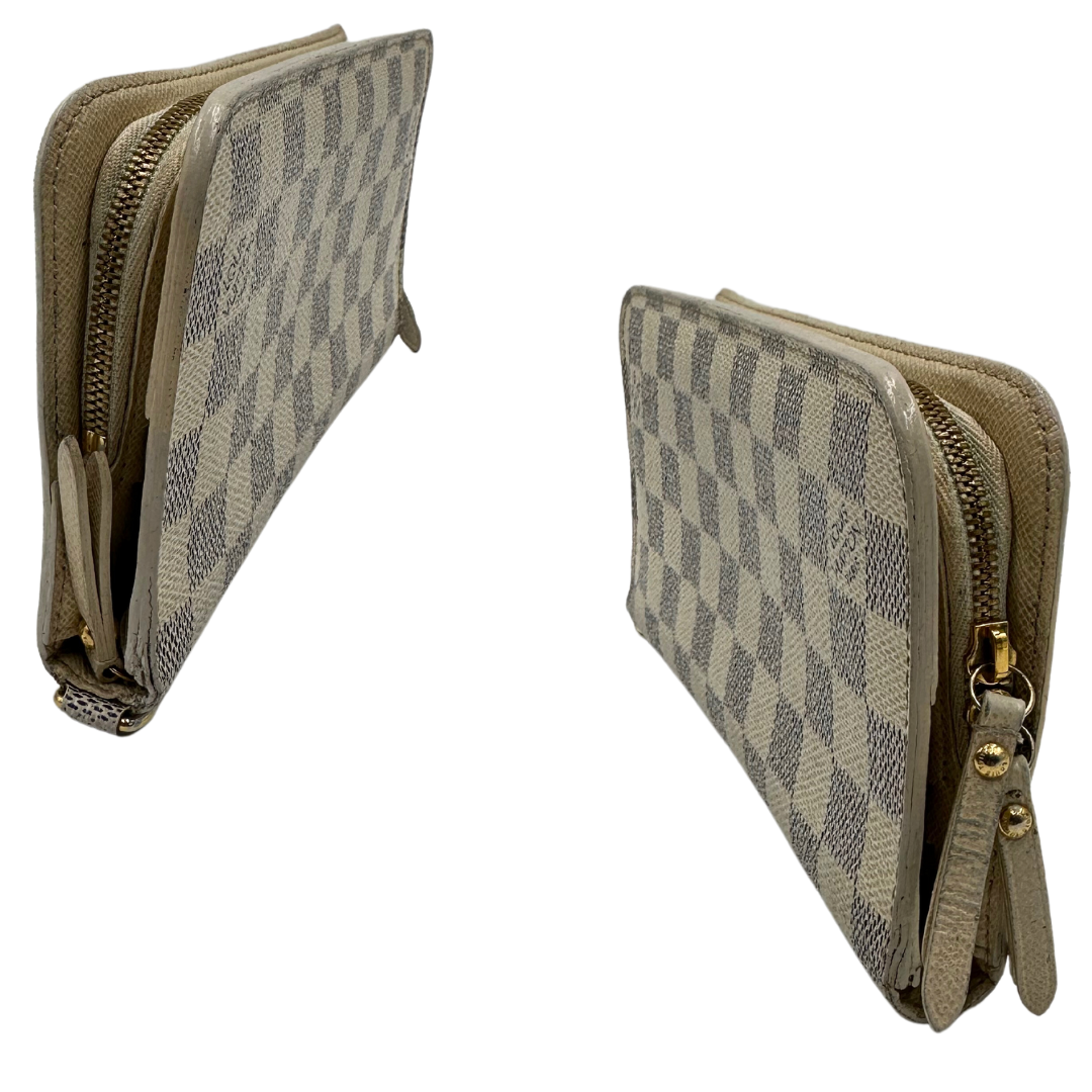 Portafoglio insolite hot sale louis vuitton