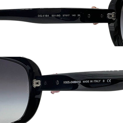 Foto occhiali da sole Dolce&Gabbana in acetato nero con fiori. Accessori di marca usati