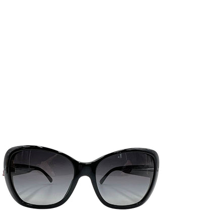 Foto occhiali da sole Dolce&Gabbana in acetato nero con fiori. Accessori di marca usati