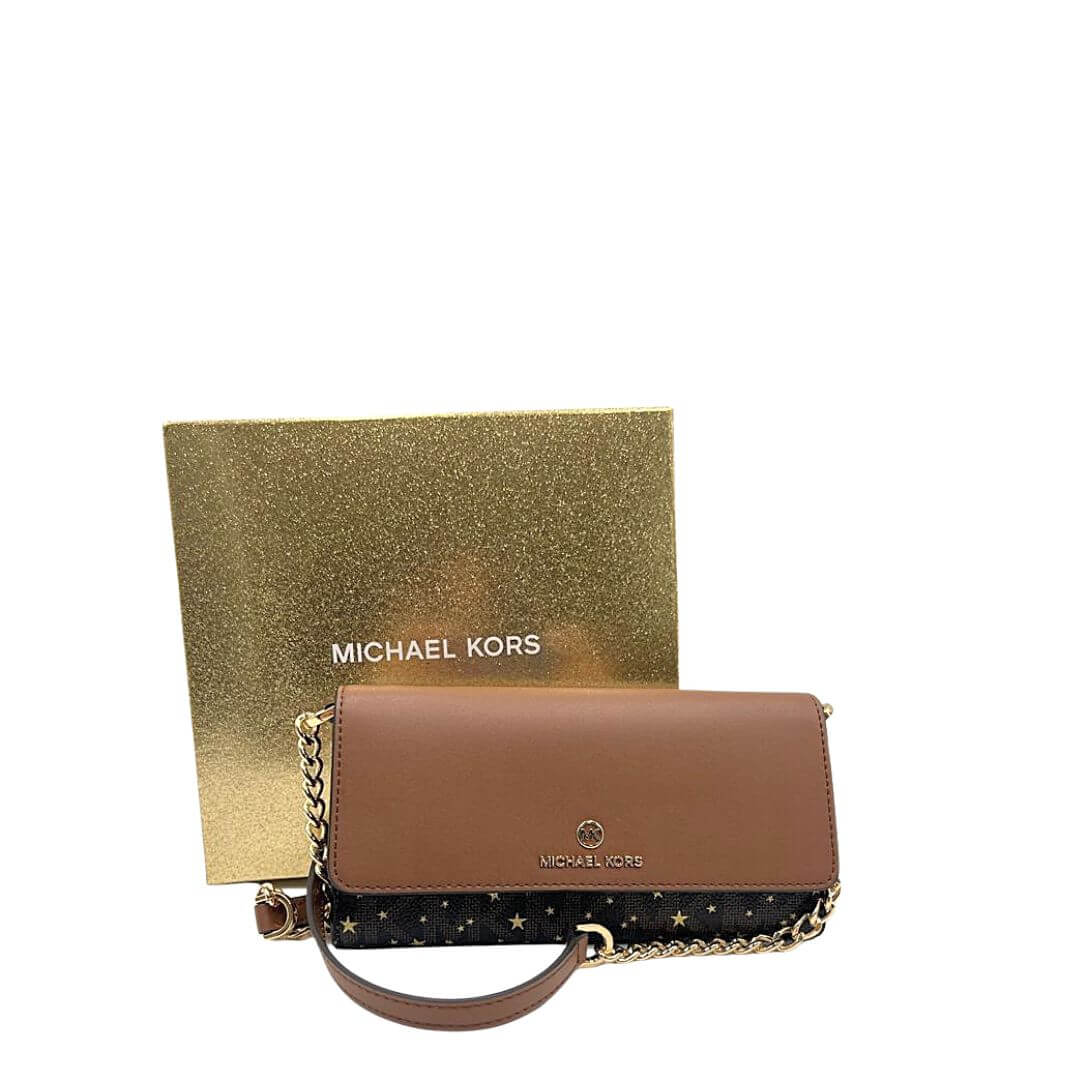 Foto pochette Michael Kors ideale come portafoglio. Borse di marca usate