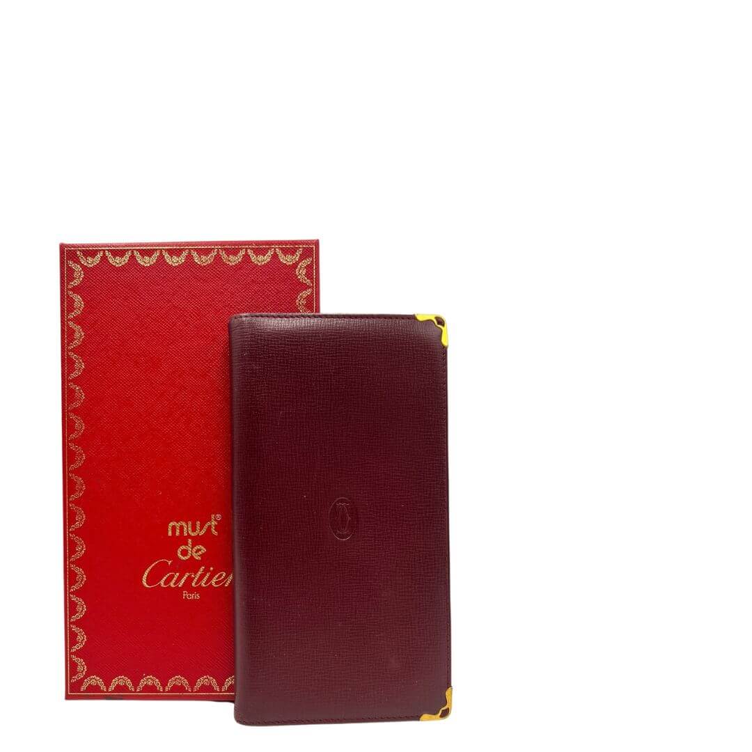 Porta carte Must De Cartier bordeaux. Accessori di marca usati